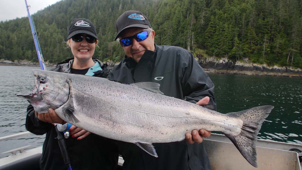 couple with catch of large salmon